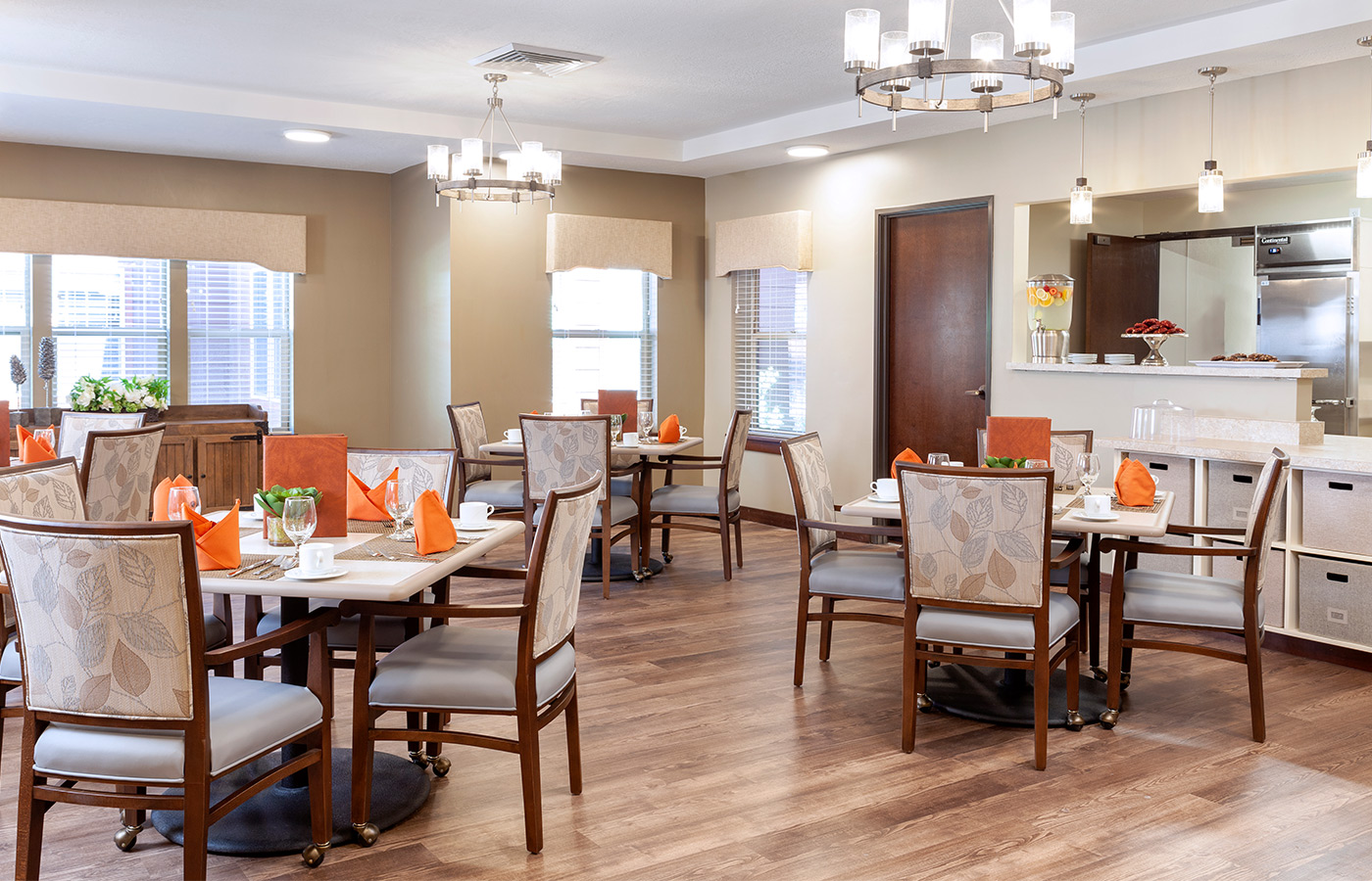 Dining table with chairs and lamps.