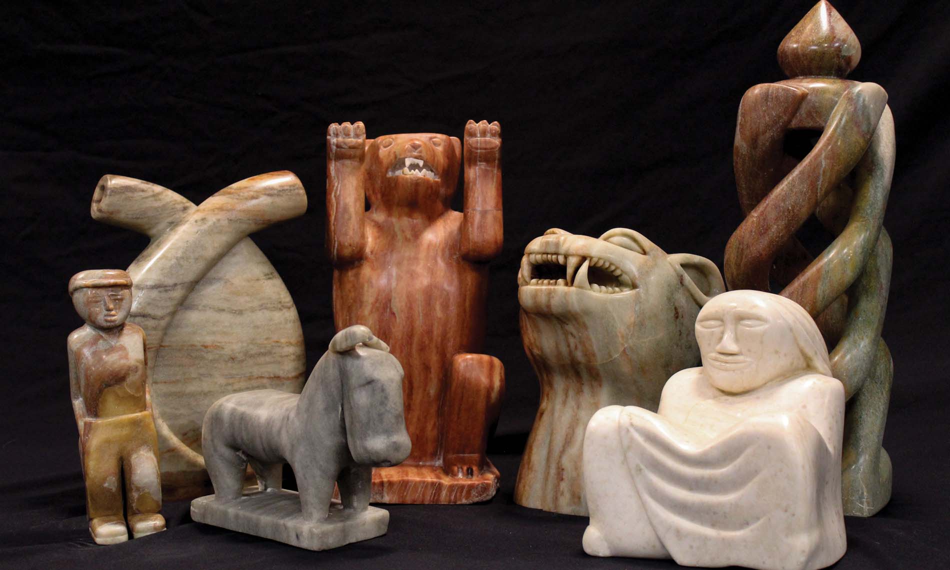 11November Multiple pieces of neutral toned sculptures.
