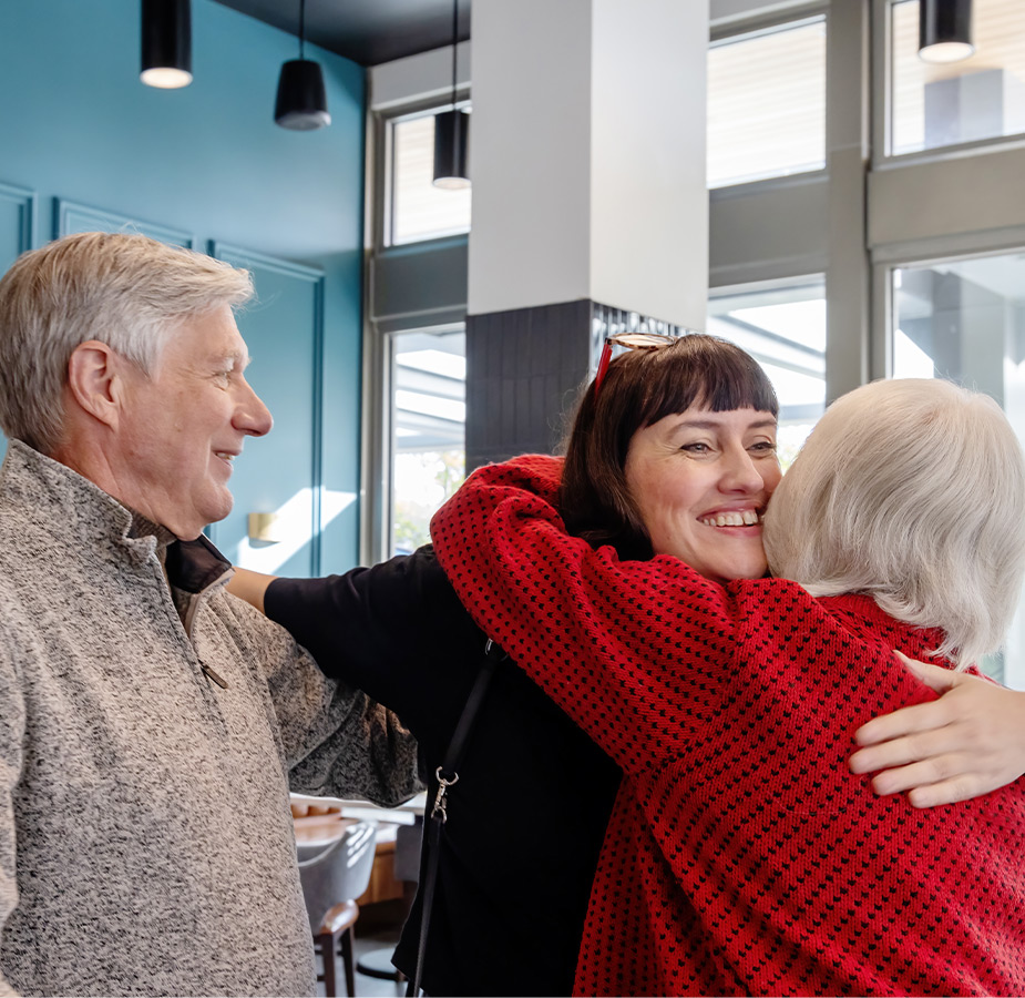 People hugging each other.