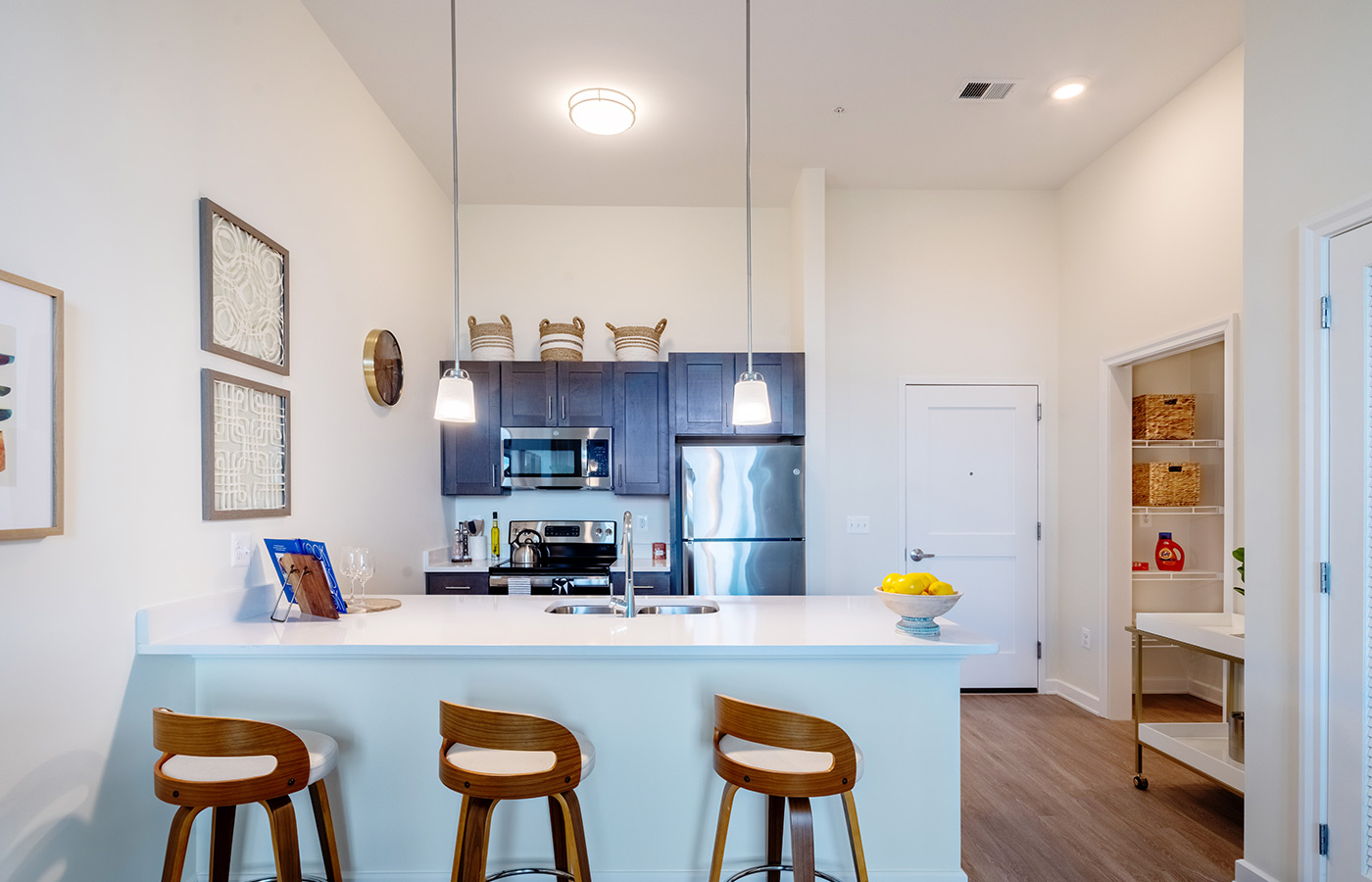 A fully furnished apartment kitchen.